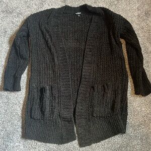 Extremely soft black sweater cardigan! Never worn. Brand new!